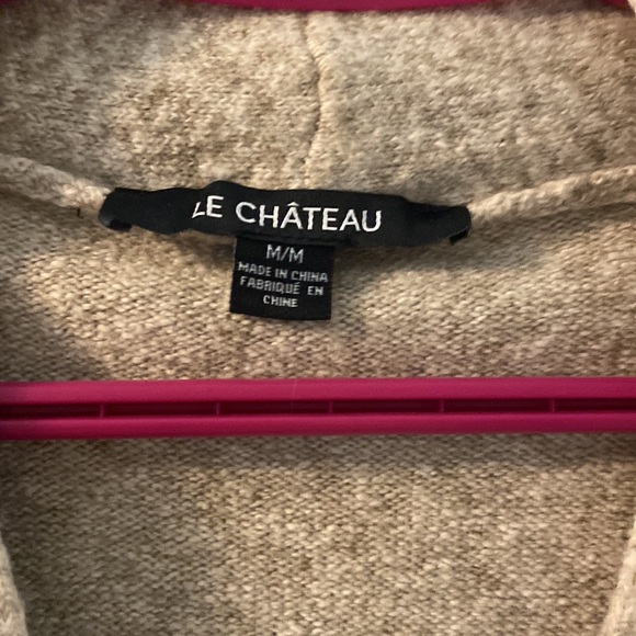 Nice long sweater never worn. - Picture 2 of 3